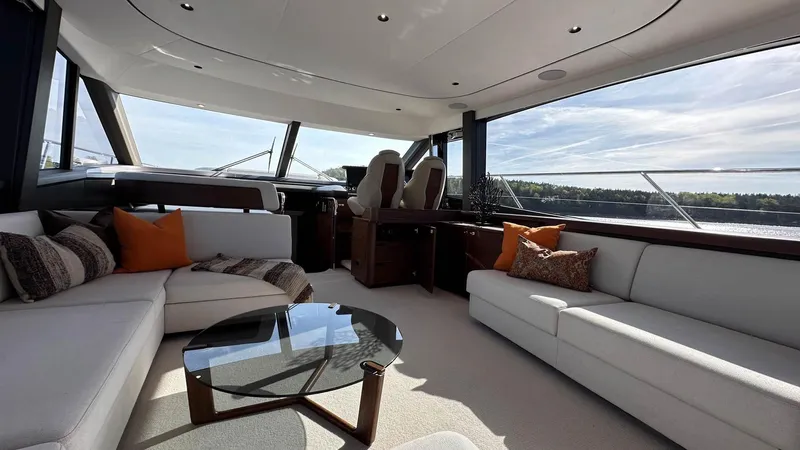 F65012 Yacht Photos Pics Luxurious interior of 2024 Princess F65 yacht with modern seating and panoramic windows.