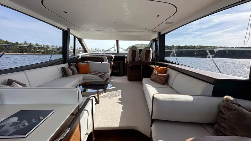 F65012 Yacht Photos Pics Luxurious interior of 2024 Princess F65 yacht with spacious seating and scenic water views.