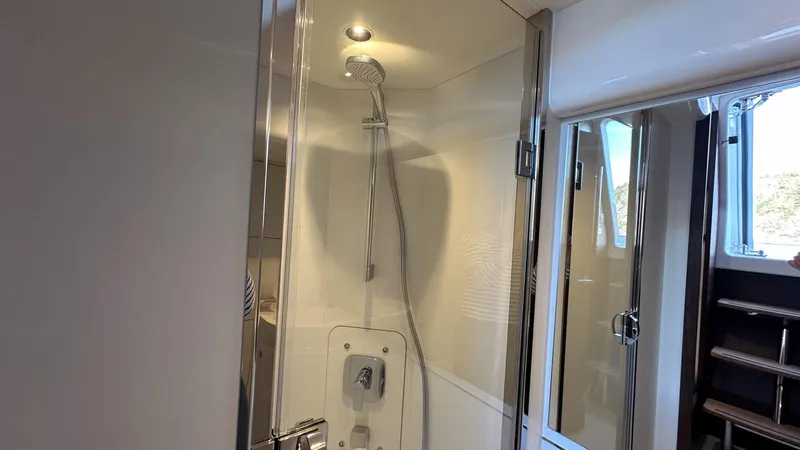 F65012 Yacht Photos Pics Luxurious shower area in 2024 Princess F65 yacht, featuring modern fixtures and elegant design.