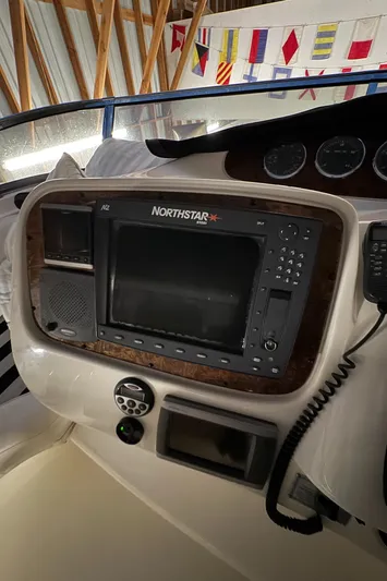  Yacht Photos Pics 2008 Meridian 580 Pilothouse dashboard with Northstar navigation system and nautical flags.