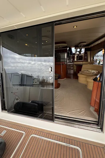  Yacht Photos Pics 2008 Meridian 580 Pilothouse yacht interior with elegant seating and wooden accents.