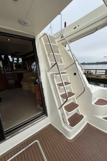  Yacht Photos Pics Staircase on 2008 Meridian 580 Pilothouse yacht with open cabin view.