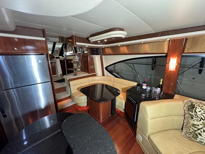  Yacht Photos Pics Luxurious interior of 2008 Meridian 580 Pilothouse yacht with modern furnishings and sleek design.