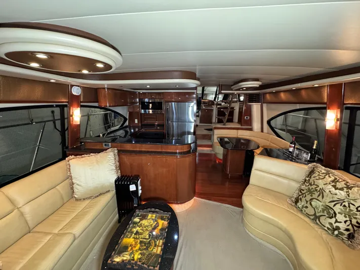  Yacht Photos Pics Luxurious interior of a 2008 Meridian 580 Pilothouse yacht with elegant seating and modern amenities.