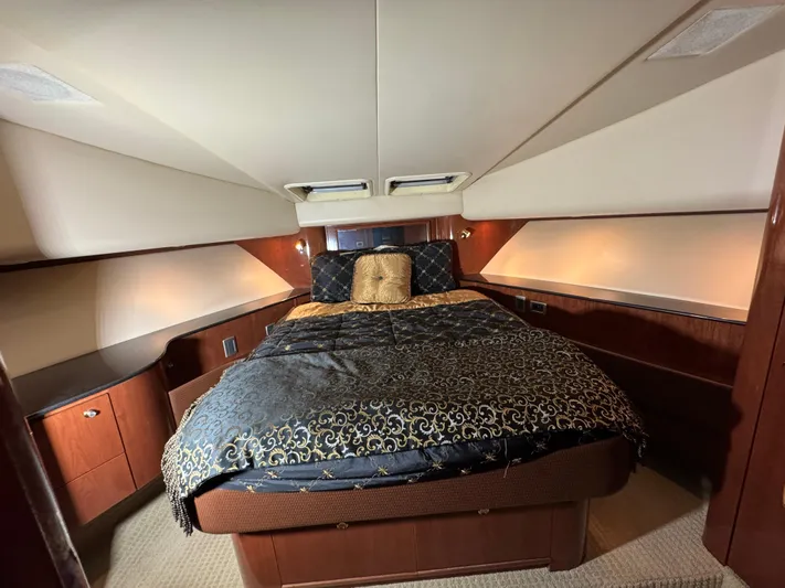  Yacht Photos Pics Luxurious bedroom interior of 2008 Meridian 580 Pilothouse yacht with elegant bedding.