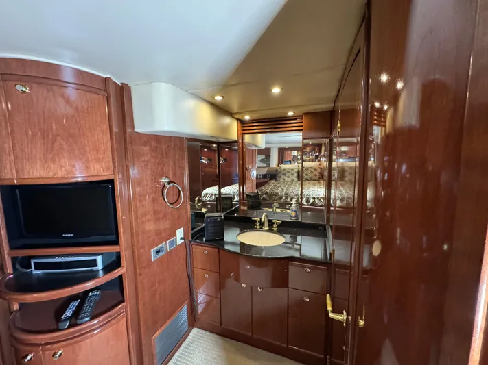  Yacht Photos Pics Luxurious interior of 2008 Meridian 580 Pilothouse yacht with wood cabinetry and modern amenities.