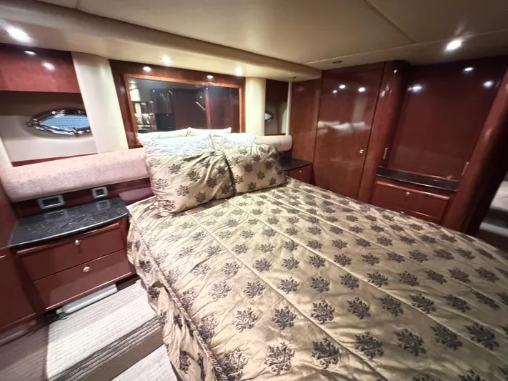  Yacht Photos Pics Luxurious bedroom interior of 2008 Meridian 580 Pilothouse yacht with elegant bedding.
