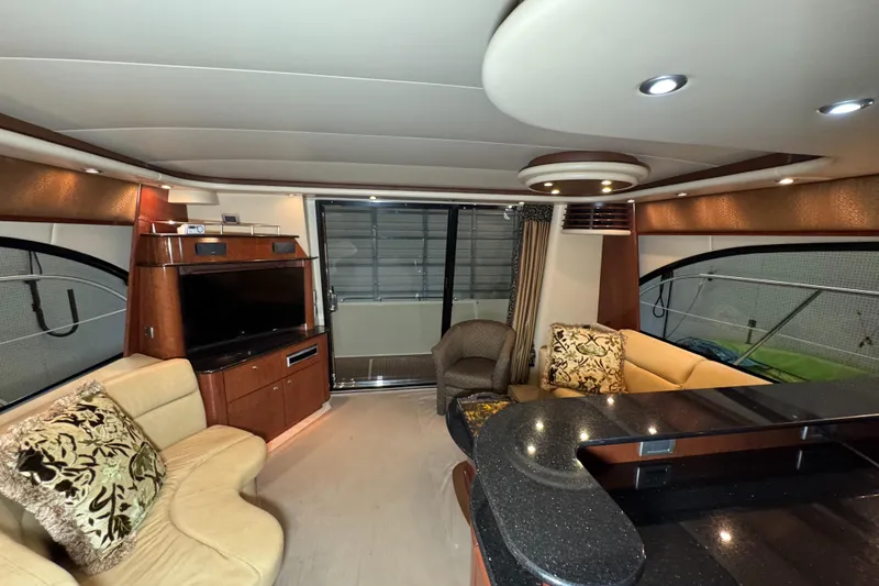  Yacht Photos Pics Luxurious interior of a 2008 Meridian 580 Pilothouse yacht with elegant seating and modern amenities.