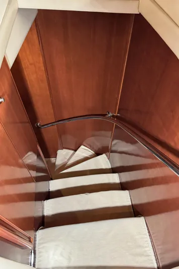  Yacht Photos Pics Staircase with wooden paneling in 2008 Meridian 580 Pilothouse yacht.