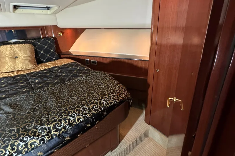  Yacht Photos Pics Luxurious cabin interior of 2008 Meridian 580 Pilothouse yacht with elegant bedding.