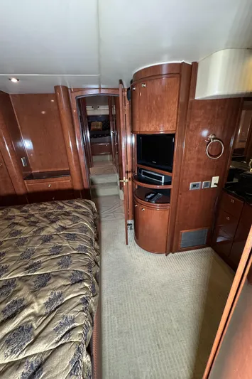  Yacht Photos Pics Luxurious interior of 2008 Meridian 580 Pilothouse yacht with wood finishes and modern amenities.
