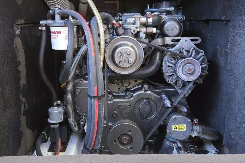  Yacht Photos Pics Engine compartment of a 2012 Jeanneau Sun Odyssey 439 sailboat, featuring a Yanmar engine.