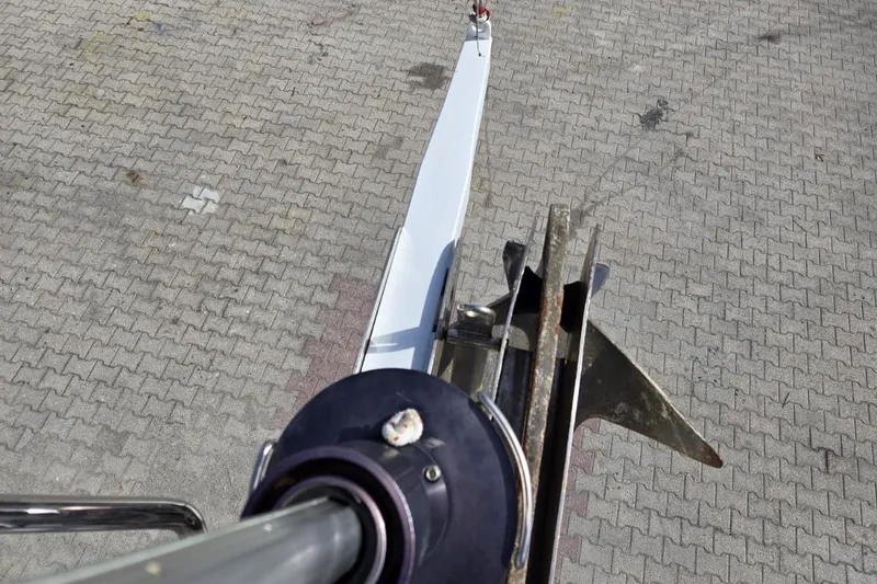  Yacht Photos Pics Jeanneau Sun Odyssey 439 anchor and bow view, 2012 model, on paved surface.