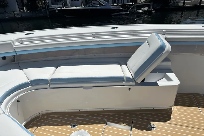  Yacht Photos Pics 2018 Yellowfin 42 boat with cushioned seating and teak deck.