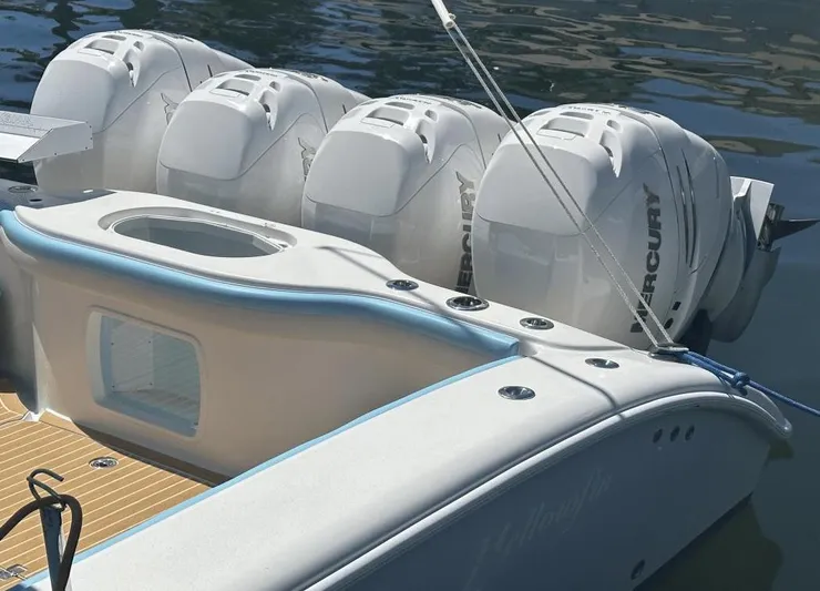  Yacht Photos Pics 2018 Yellowfin 42 boat with four Mercury outboard engines on water.