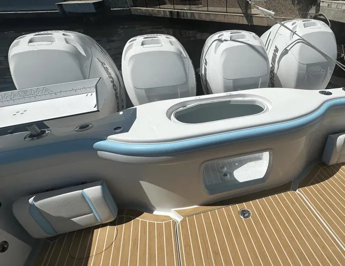  Yacht Photos Pics 2018 Yellowfin 42 boat with four powerful outboard engines, sleek deck design.