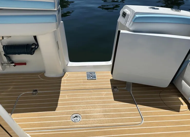  Yacht Photos Pics 2018 Yellowfin 42 boat deck with teak flooring and seating.