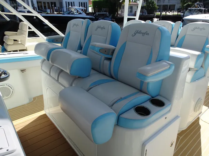  Yacht Photos Pics Luxurious seating on 2018 Yellowfin 42 boat with blue and white upholstery.