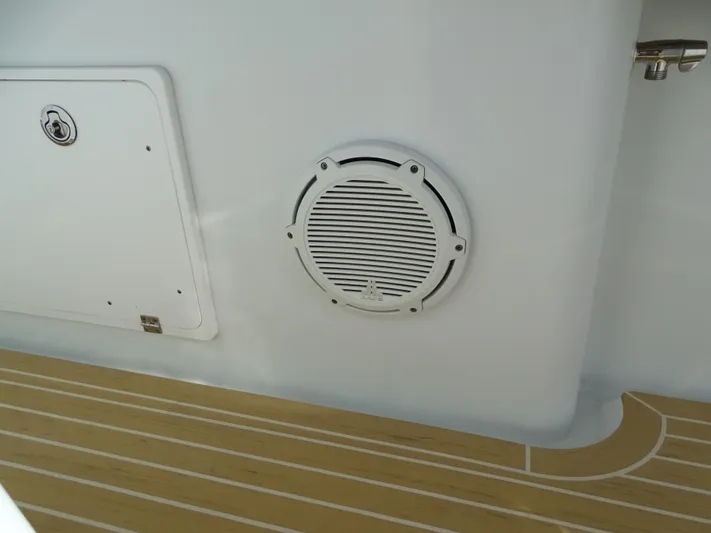  Yacht Photos Pics 2018 Yellowfin 42 boat interior with speaker and storage compartment.