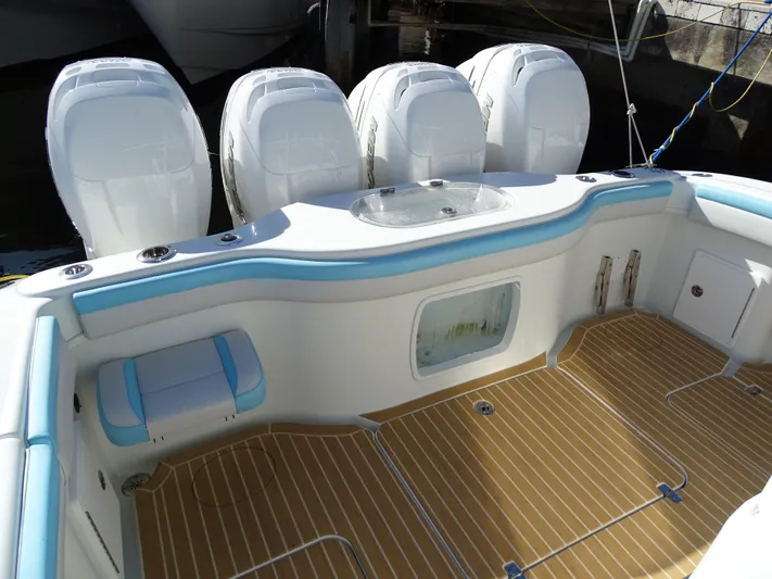  Yacht Photos Pics 2018 Yellowfin 42 boat with four powerful outboard engines and spacious deck.