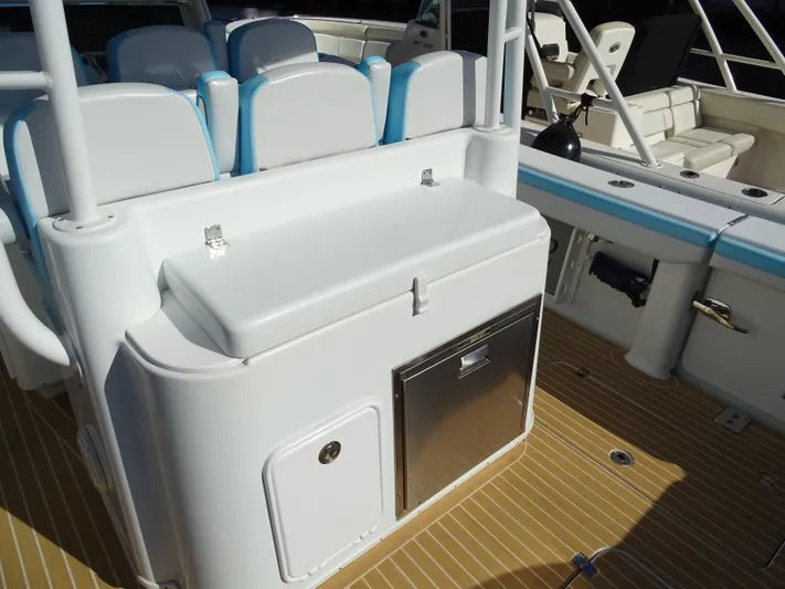  Yacht Photos Pics 2018 Yellowfin 42 boat interior with seating and storage compartments.