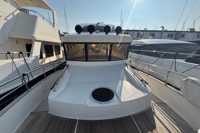  Yacht Photos Pics 2023 Nord Star 49 SCY yacht docked, showcasing sleek design and spacious deck.