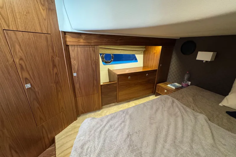  Yacht Photos Pics Luxurious cabin interior of 2023 Nord Star 49 SCY yacht with wooden finishes.