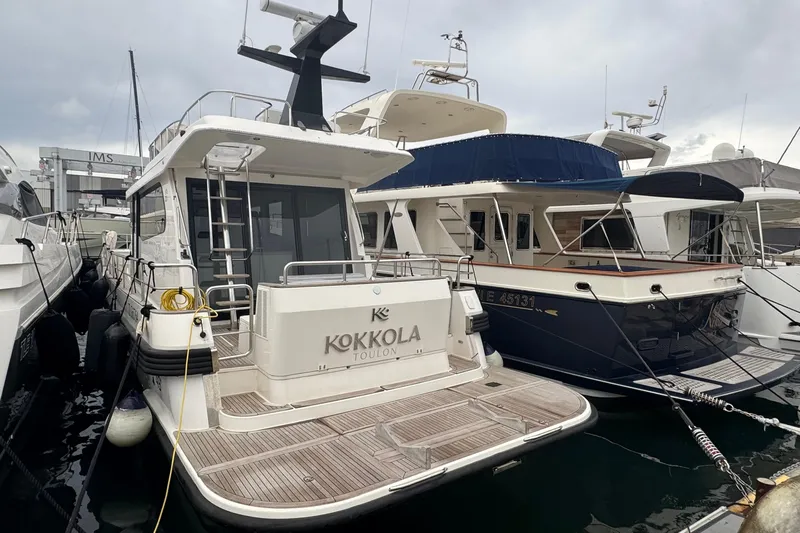  Yacht Photos Pics Nord Star 49 SCY 2023 yacht docked at marina, featuring sleek design and modern amenities.