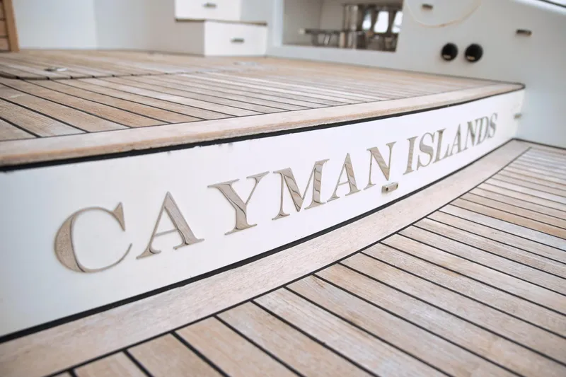 Kailua Yacht Photos Pics Sunreef 74 yacht deck with "Cayman Islands" inscription, 2018 model.