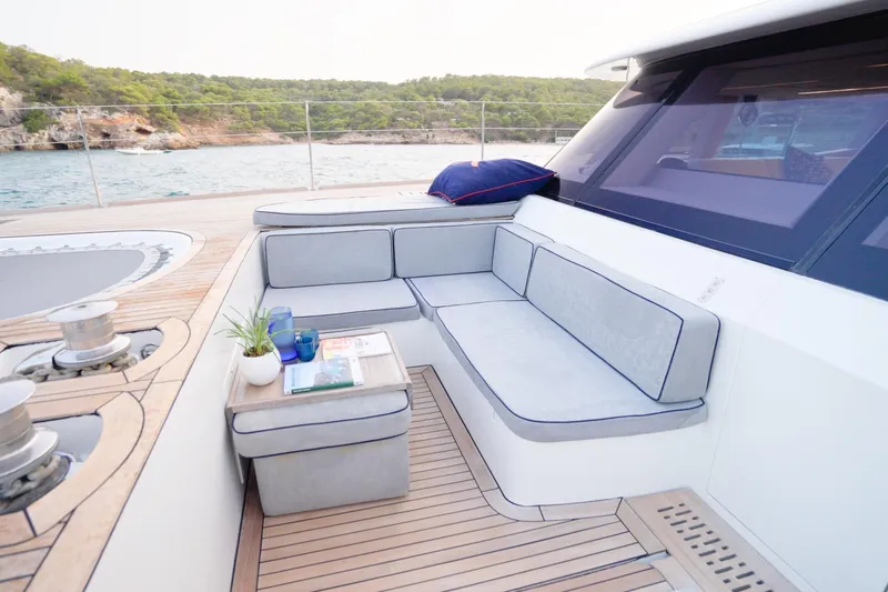 Kailua Yacht Photos Pics Luxurious Sunreef 74 yacht deck with comfortable seating, ocean view, and elegant decor, 2018 model.