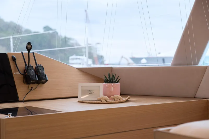 Kailua Yacht Photos Pics Interior of 2018 Sunreef 74 yacht with decor and communication devices.