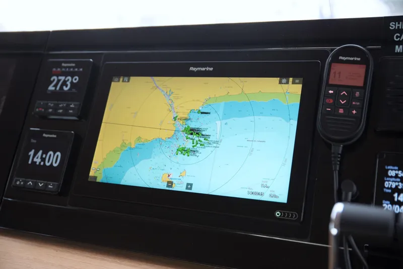 Kailua Yacht Photos Pics Navigation system on a 2018 Sunreef 74 yacht, featuring Raymarine display and controls.