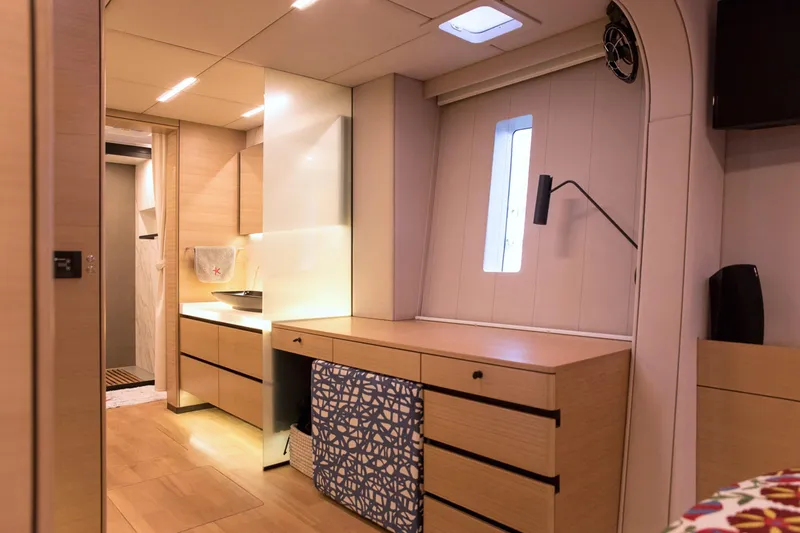 Kailua Yacht Photos Pics Luxurious interior of 2018 Sunreef 74 yacht with modern cabinetry and ambient lighting.