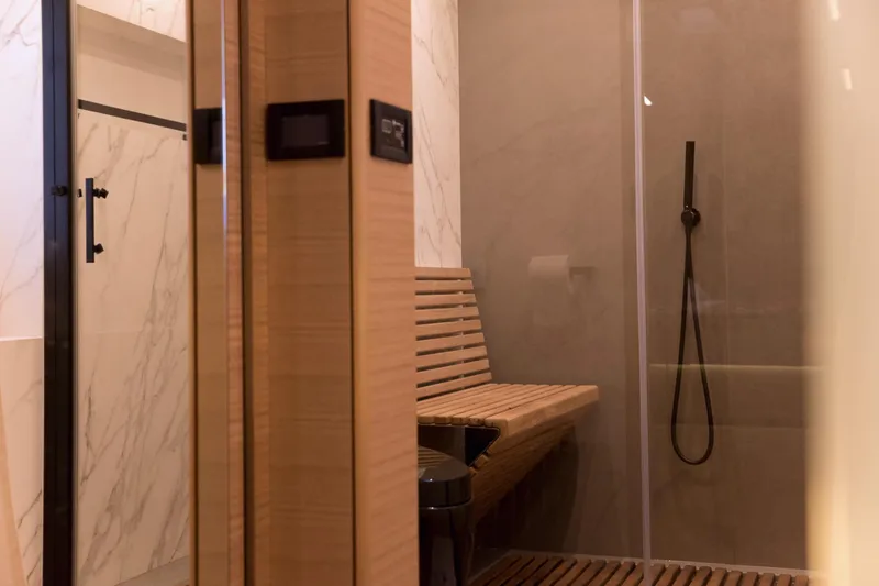 Kailua Yacht Photos Pics Luxurious Sunreef 74 yacht interior shower with wooden bench, 2018 model.