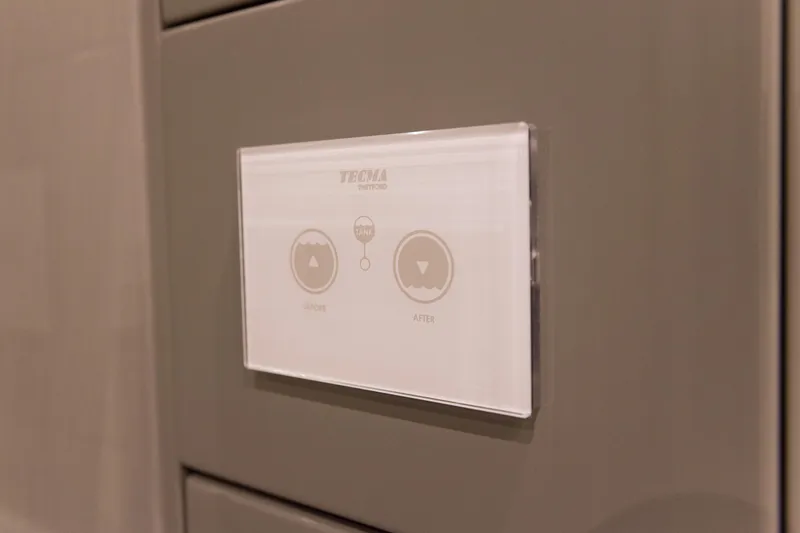 Kailua Yacht Photos Pics Control panel on 2018 Sunreef 74 yacht, featuring Tecma buttons for water management.