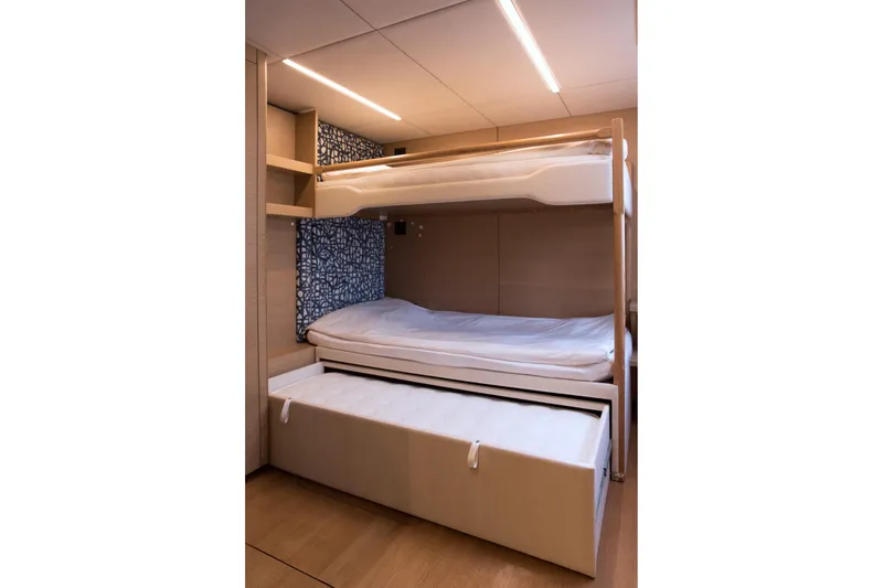 Kailua Yacht Photos Pics Bunk beds in 2018 Sunreef 74 yacht cabin with modern design and storage drawer.