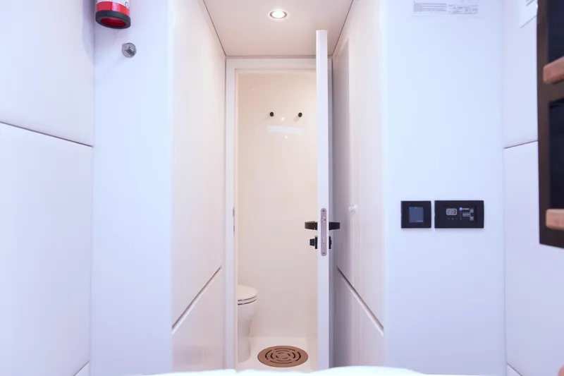 Kailua Yacht Photos Pics Interior of 2018 Sunreef 74 yacht bathroom with modern white design.