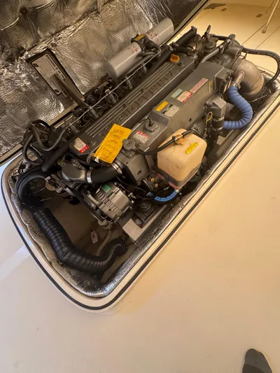 Tamarack Yacht Photos Pics 1999 Hinckley Picnic boat engine compartment with detailed mechanical components.