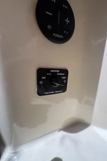 Tamarack Yacht Photos Pics Heater control panel on a 1999 Hinckley Picnic boat, featuring adjustable settings.