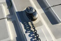 Deck of 2003 Custom CATAMARAN 12.30 M with anchor chain and winch.