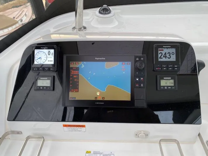  Yacht Photos Pics Lagoon 42 2024 yacht navigation system with Raymarine displays and controls.