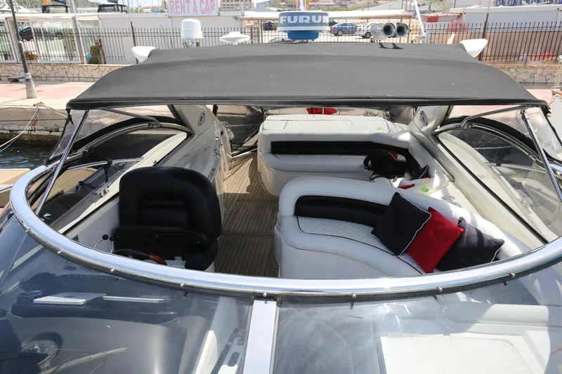  Yacht Photos Pics 2001 Sunseeker Camargue 50 yacht interior with seating and canopy.