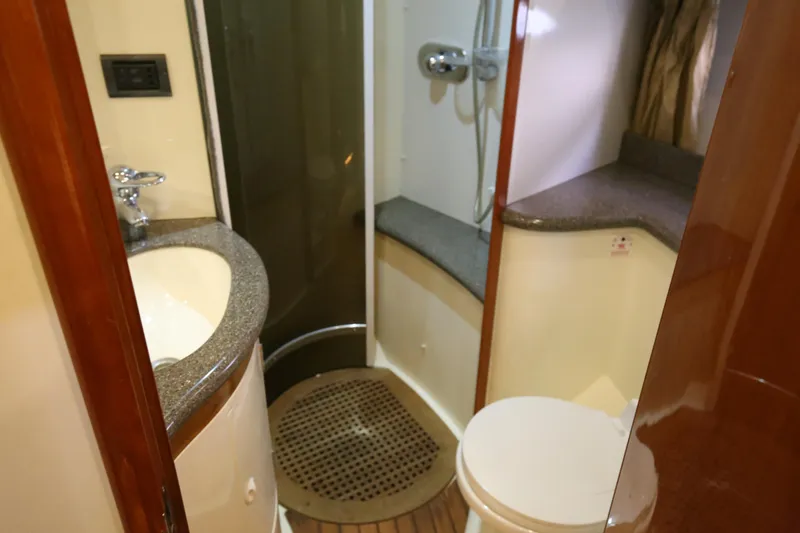  Yacht Photos Pics Luxurious bathroom in 2001 Sunseeker Camargue 50 yacht with shower and sink.