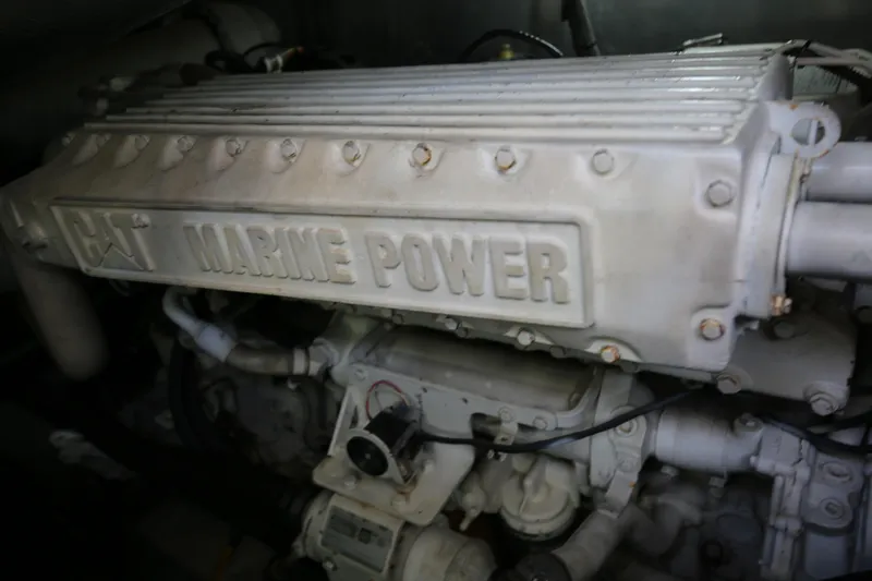  Yacht Photos Pics Engine of 2001 Sunseeker Camargue 50 yacht, featuring CAT Marine Power branding.