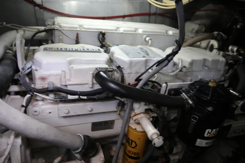  Yacht Photos Pics Engine room of 2001 Sunseeker Camargue 50 yacht, featuring Caterpillar machinery.