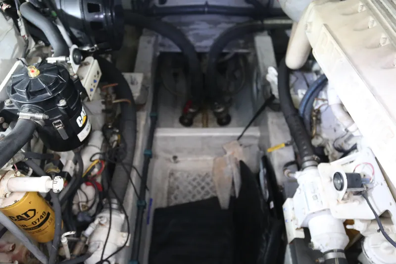  Yacht Photos Pics Engine room of a 2001 Sunseeker Camargue 50 yacht, showcasing mechanical components.