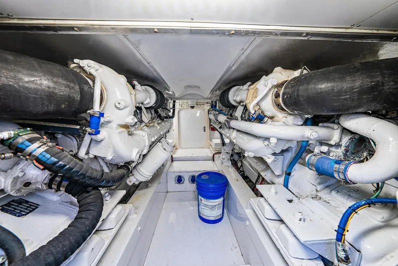 Reel Devocean Yacht Photos Pics Engine room of a 1990 Monterey Custom Sportfish boat with dual engines.