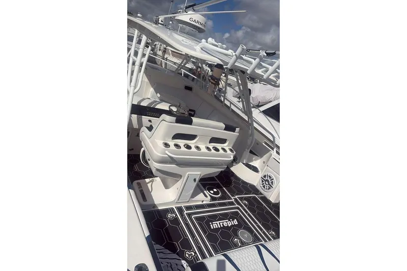  Yacht Photos Pics 2008 Intrepid 390 Sport Yacht cockpit with modern seating and navigation equipment.