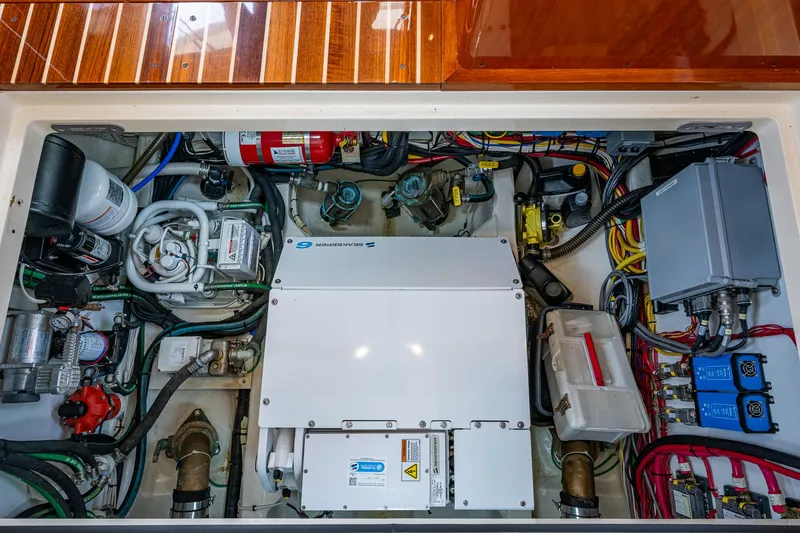  Yacht Photos Pics Engine room of 2021 Hinckley Talaria 43 Motoryacht, showcasing mechanical and electrical systems.