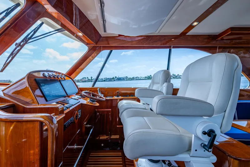  Yacht Photos Pics Interior of 2021 Hinckley Talaria 43 Motoryacht with luxurious helm and seating.